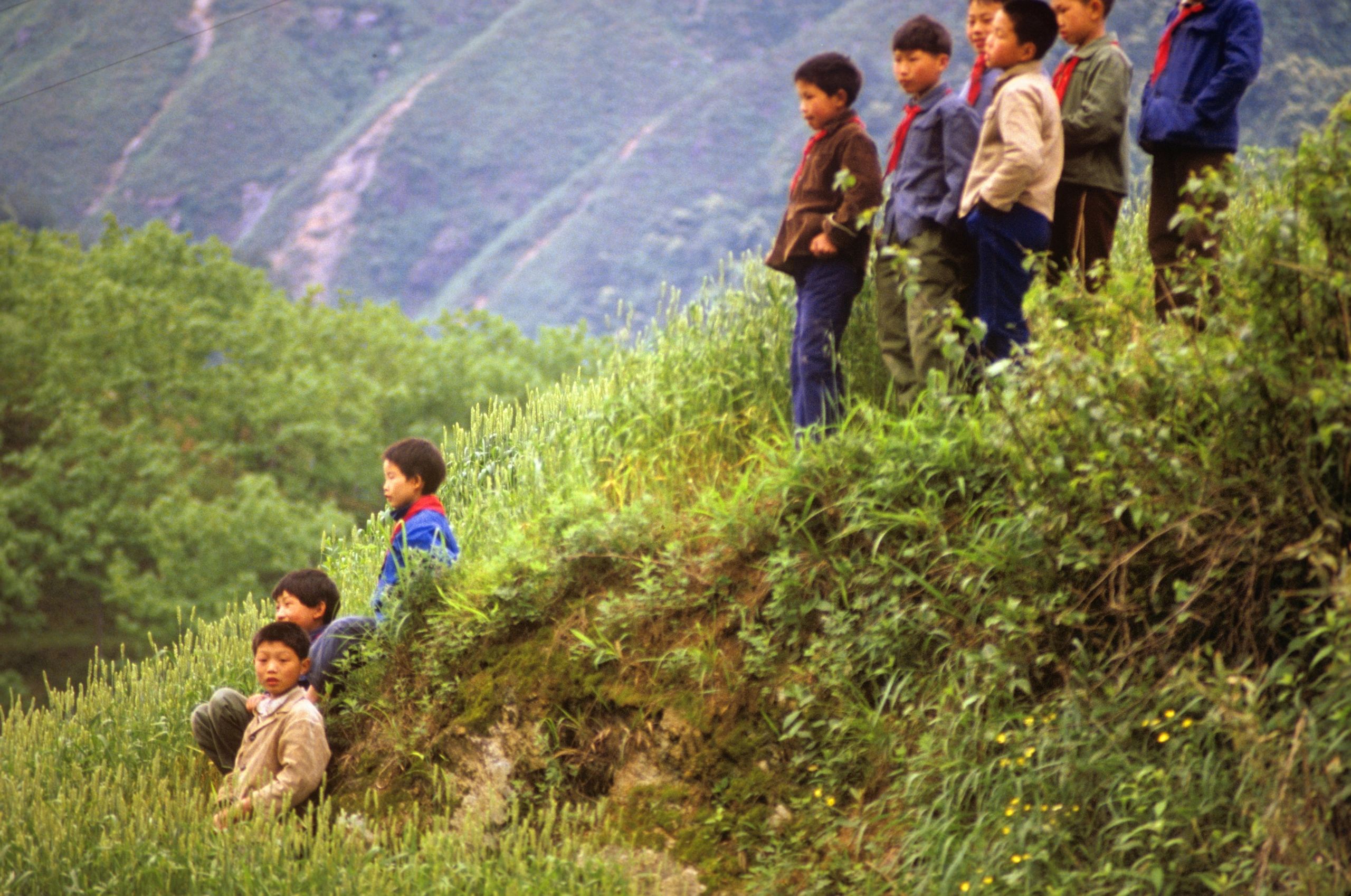 Children on a hillside in China